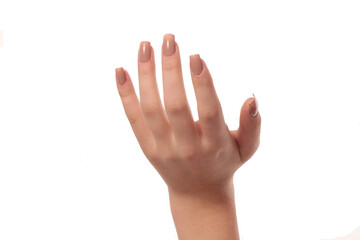 hand with nude manicure on white background
