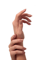 hand with nude manicure on white background