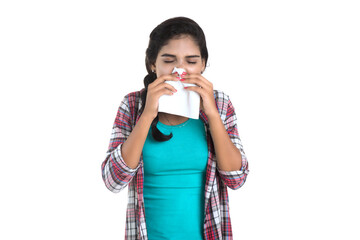 Young Sick woman blowing her nose. Allergic rhinitis. Has fever. Young woman with cold