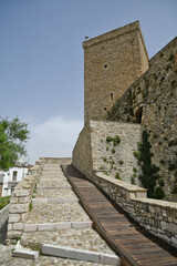 A small street between the old houses of Deliceto, a medieval village in the mountains of the Pugliaregion.