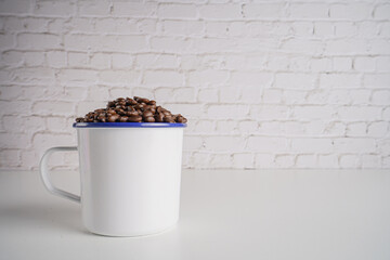 coffee beans in white glass white brick background scene