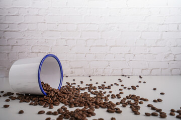 coffee beans in white glass white brick background scene