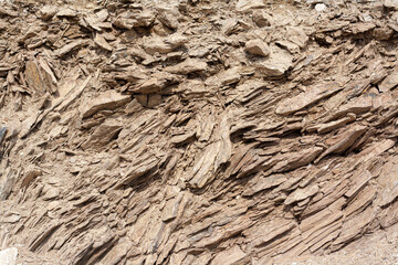 Layers of gravel in the natural environment. Natural stone.