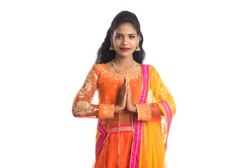 Beautiful Indian girl with welcome expression (inviting), greeting Namaste