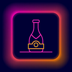 Glowing neon line Champagne bottle icon isolated on black background. Colorful outline concept. Vector