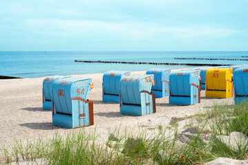 beautiful colorful beach chair in the sand on a sunny, relaxed day on the coast of Mecklenburg...
