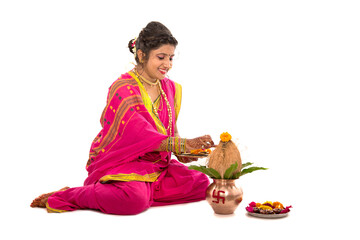 Indian Traditional Girl performing worship with copper kalash, Indian Festival, copper kalash with...