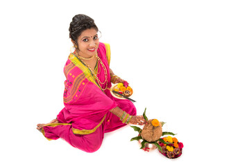 Indian Traditional Girl performing worship with copper kalash, Indian Festival, copper kalash with...