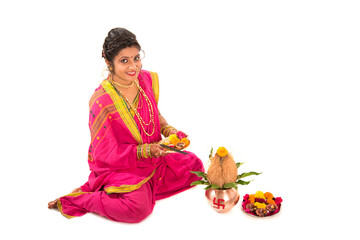 Indian Traditional Girl performing worship with copper kalash, Indian Festival, copper kalash with...
