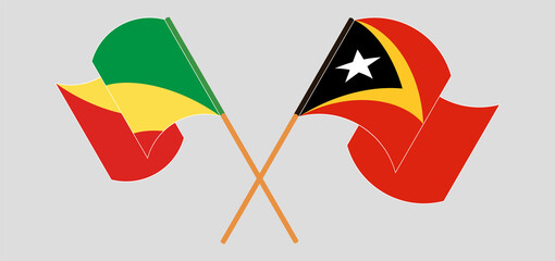 Crossed and waving flags of Republic of the Congo and East Timor