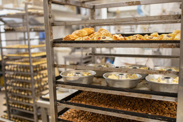Freshly baked and raw bread. Industrially made baked goods