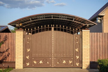 Automatic opening gates and a canopy