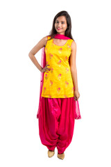 Beautiful Indian traditional girl posing on white background.