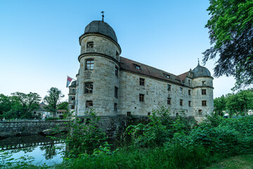 Mitwitz Moated Castle, a historic jewel in Bavaria, was built in the 13th century and is surrounded by a picturesque park.