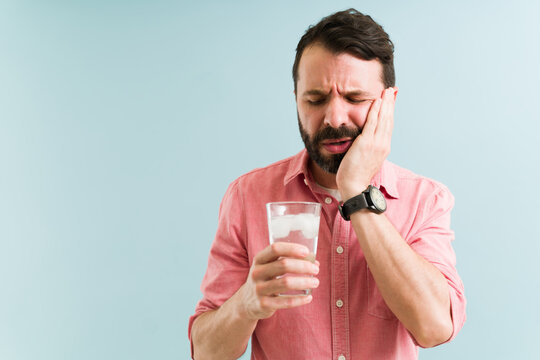 Attractive Man With Pain In His Mouth