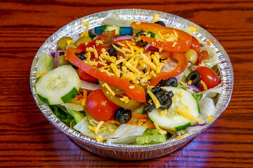 Salad in a takeout container