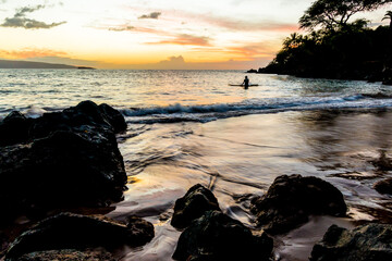Stand Up Paddler Enjoying The Sunset at Makena Landing Park, Maui, Hawaii, USA