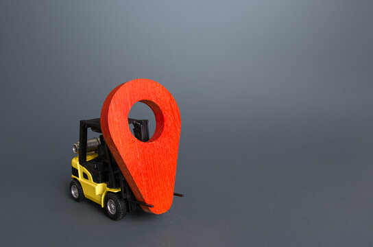 Yellow forklift carries a red location pin pointer. Transportation services and logistics, warehouse management. Real-time tracking of deliveries and goods. Freight infrastructure, redeployment