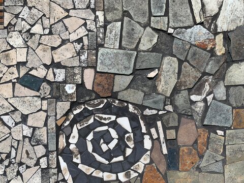 Mosaic tile wall background, the beauty of arranging different tiles together.