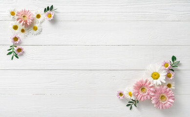 Flowers composition. White flowers on white wooden background. Wedding mockup with pink and white...