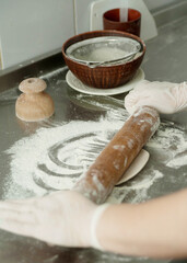  Female hands makes georgian food khinkali.
