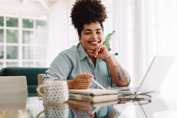 Attractive woman working from home