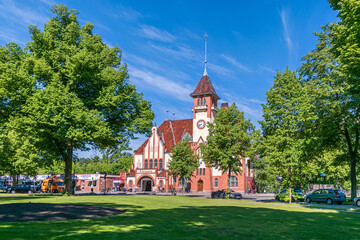 Neo-Gothic entrance building of the Nikolassee railway station at the square Hohenzollernplatz in Berlin, Germany