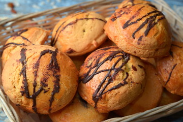 Fresh pastries bakery products, on wooden table