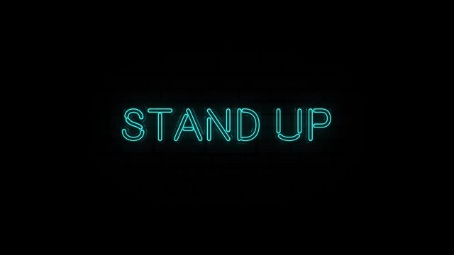 Neon text of Stand up on Black Background. 4k