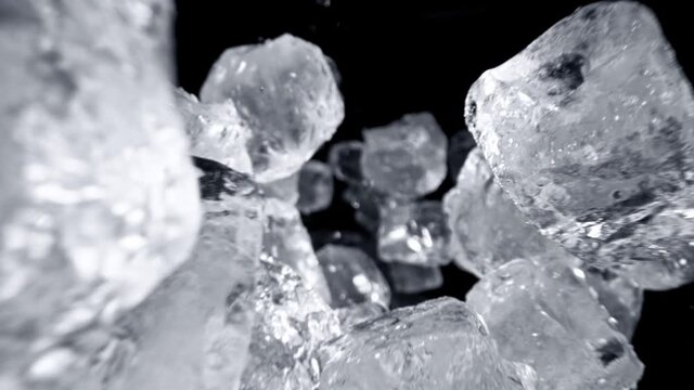 Super Slow Motion Shot of Ice Cubes Flying Towards Camera at 1000fps.