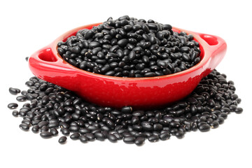 black beans in bag on white background