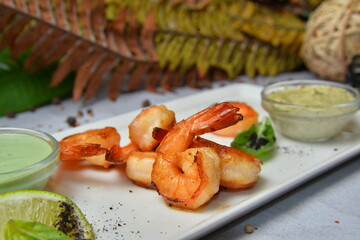 Grilled tiger shrimps with lemon and sauce- seafood style - Image