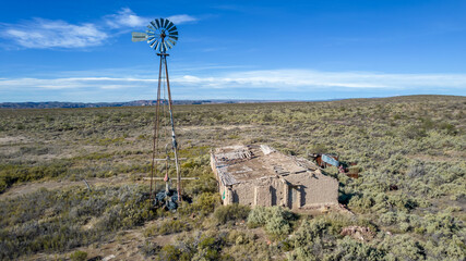 Abandoned Argentine ranch next to a water mill.