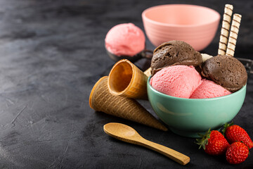 Bowl with Neapolitan ice cream on dark background. - obrazy, fototapety, plakaty
