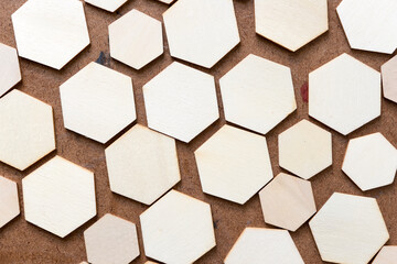 pattern with wooden hexagons on an old art board