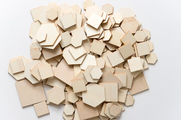 stack of wooden shapes on white