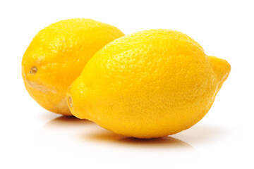 Ripe lemons on white background