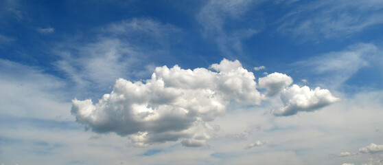Naklejka na ściany i meble Blue sky background with tiny clouds. blue sky panorama.