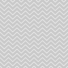 Zigzag lines, thin white lines on a gray background.