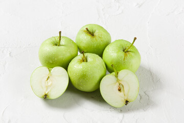 Ripe green apples on table