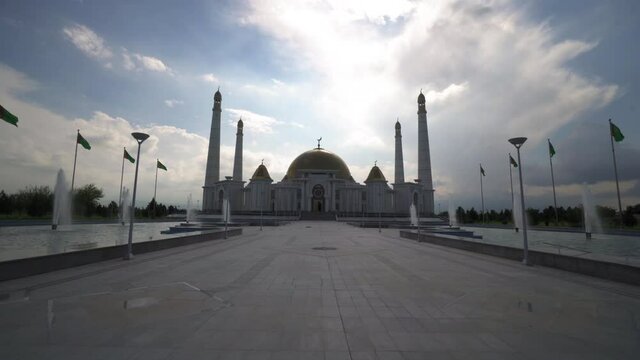 Beautiful Fountains Over Landscape Of Famous Mosque Against Cloudy Sky - Ashgabat, Turkmenistan