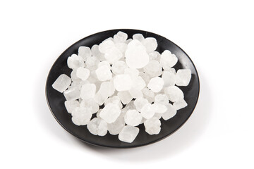 white rock candy sugar isolated on black background