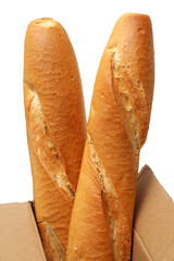 crusty mini baguettes on white surface