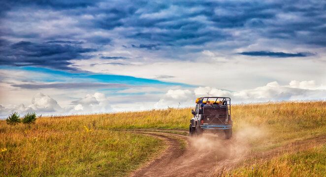 Fototapeta Banner background car ATV tour of Africa travel to national parks safari trip or savannah
