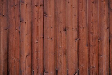 Wood plank background.Wood texture.Wooden  red shabby surface. Rustic wooden grunge texture. striped timber board.
Dark shabby board background