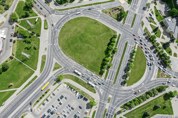 top down view of roundabout with cars traffic on it. aerial photography with drone.