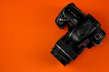 Camera on orange background