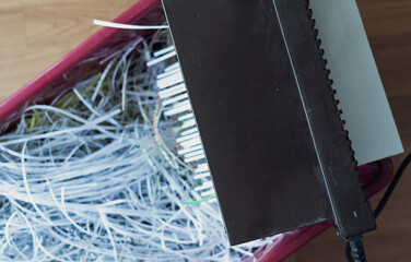 Shredding machine top view. Shredding documents for security.