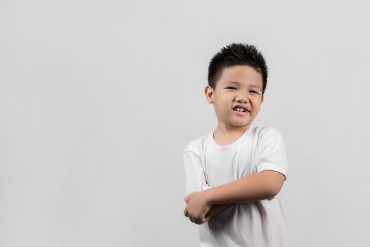 Asian little boys studio portrait on gray background