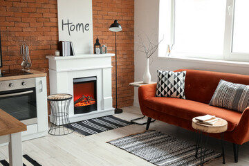 Obraz premium Stylish fireplace in interior of modern kitchen